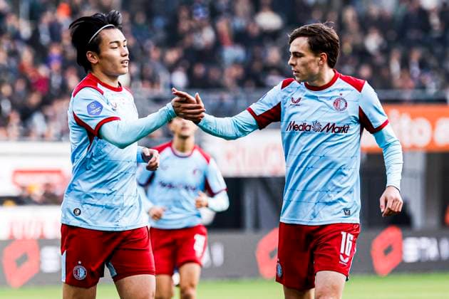Ayase Ueda of Feyenoord Rotterdam celebrates with Leo Sauer of Feyenoord Rotterdam after scoring his teams first goal Heracles Almelo v Feyenoord Rotterdam, Eredivisie, Heracles Almelo v Feyenoord Rotterdam, Erve Asito, October 19, 2025, Almelo, Netherlands.