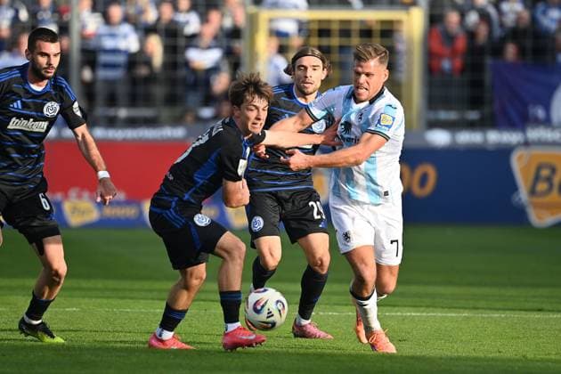 Florian NIEDERLECHNER TSV 1860 Muenchen , Action,duel against Simon SYMALLA DU Soccer 3 Liga,11 Matchday, Season 2025 26 TSV 1860 Muenchen MSV Duisburg on 19 10 2025 GRUENWALDER STADION