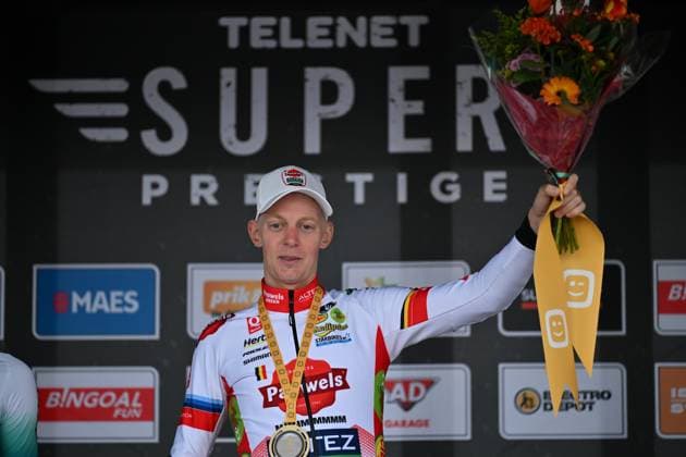 Belgian Michael Vanthourenhout celebrates on the podium after winning the men elite race of the Cyclocross Ruddervoorde, Sunday 19 October 2025 in Ruddervoorde, stage 2 (out of 7) of the Superprestige cyclocross cycling competition. LUCxCLAESSEN  x137301069x