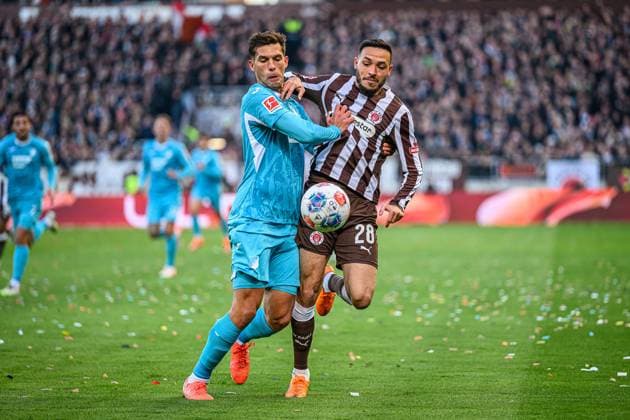 Soccer I Men I Season 2025 2026 I Bundesliga I 7 Matchday I FC St Pauli TSG 1899 Hoffenheim I 19 10 2025 Robin Hranac 2, TSG 1899 Hoffenheim , Mathias Pereira Position 28, FC St Pauli Hamburg Millerntor Stadion Hamburg Germany Copyright: xLobecax xHenningxRohlfsx