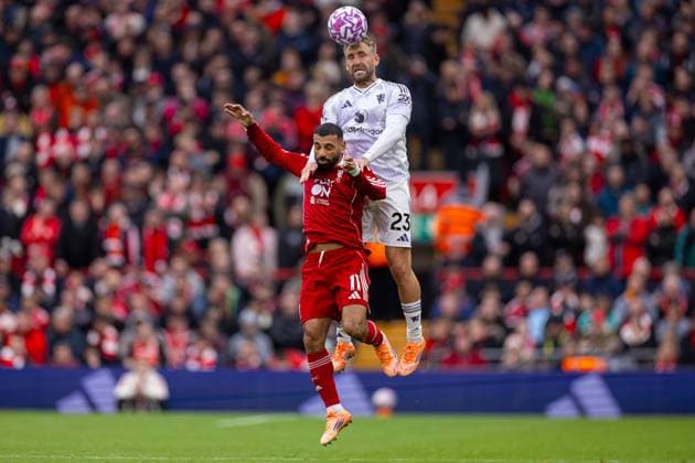 Football - FA Premier League - Liverpool FC v Manchester United, ManU FC LIVERPOOL, ENGLAND - Sunday, October 19, 2025: Liverpool s Mohamed Salah challenges for a header with Manchester United s Luke Shaw during the FA Premier League match between Liverpool FC and Manchester United FC at Anfield. (Photo by David Rawcliffe Propaganda) LIVERPOOL Anfield MERSEYSIDE ENGLAND  Copyright: xDavidxRawcliffex P2025-10-19-Liverpool_Man_Utd-45
