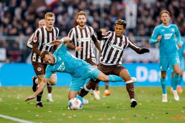 Hamburg, 19 October 2025 Soccer, 1 Bundesliga 2025 26, FC St Pauli TSG 1899 Hoffenheim Vladimir Coufal TSG 1899 Hoffenheim, 34 , Joel Chima Fujita FC St Pauli, 16 DFL REGULATIONS PROHIBIT ANY USE OF PHOTOGRAPHS AS IMAGE SEQUENCES AND OR QUASI VIDEO