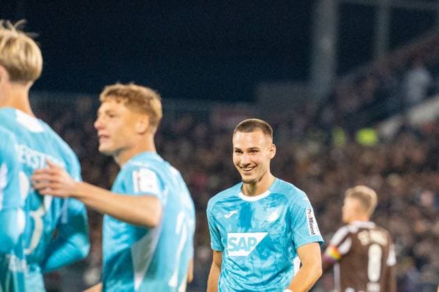 Germany, Soccer, 1 Bundesliga, Matchday 7 2025 2026, FC St Pauli TSG Hoffenheim on 19 10 in Hamburg Millerntor Stadion the 0 3 by Grischa Prömel TSG Hoffenheim 6 Goal celebration and Tim Lemperle TSG Hoffenheim 19 Copyright: xSvenxHeidmannx