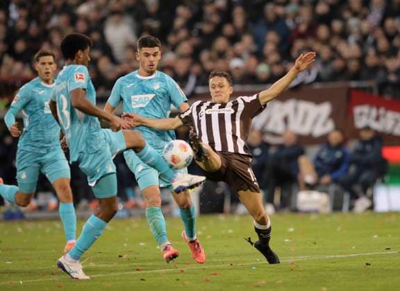 Photo Martijn KAARS Pauli tackles Bernardo , left Football 1 Bundesliga , FC St Pauli TSG Hoffenheim on Sun 19 10 2025