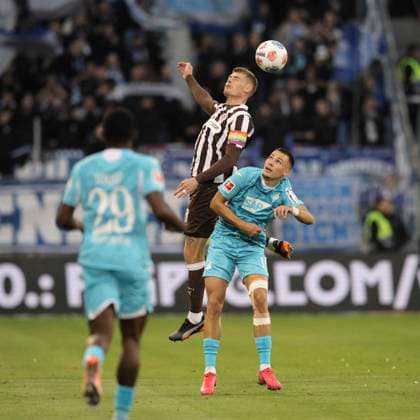 Photo Eric SMITH Pauli heads against Tim Lemperle TSG Soccer 1 Bundesliga , FC St Pauli TSG Hoffenheim on Sun 19 10 2025