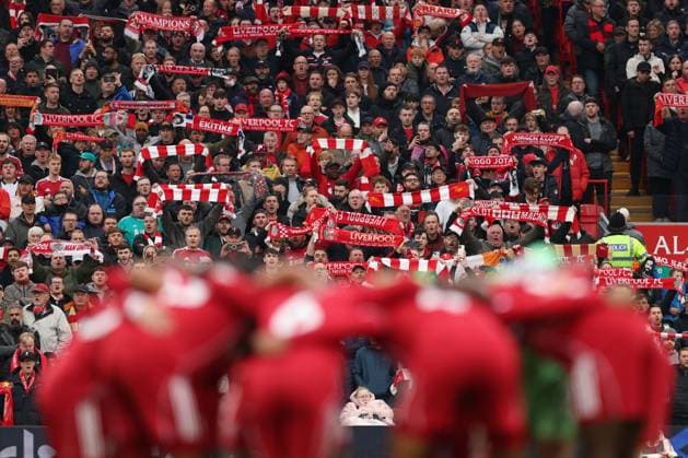 Liverpool fans hold up scarves ahead of the game. Liverpool v Manchester United, ManU Premier League, Football, Anfield, Liverpool, UK - 19 Oct 2025Liverpool Anfield United Kingdom EDITORIAL USE ONLY No use with unauthorised audio, video, data, fixture lists, club league logos or live services. Online in-match use limited to 120 images, no video emulation. No use in betting, games or single club league player publications.  Copyright: xRyanxBrowne Shutterstockx 15548302ch