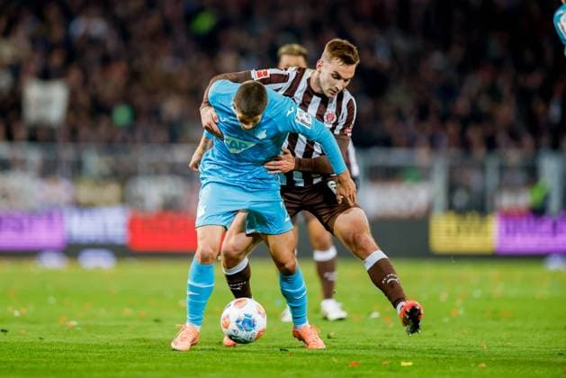 Hamburg, 19 October 2025 Football, 1 Bundesliga 2025 26, FC St Pauli TSG 1899 Hoffenheim Andrej Kramaric TSG 1899 Hoffenheim, 27 , James Sands FC St Pauli, 6 DFL REGULATIONS PROHIBIT ANY USE OF PHOTOGRAPHS AS IMAGE SEQUENCES AND OR QUASI VIDEO