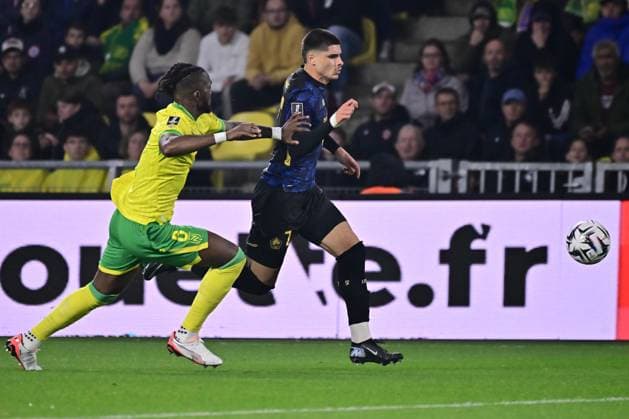 FOOTBALL : Nantes vs Lille - Ligue 1 - 19 10 2025 Chidozie Collins Awaziem ( 6 - Nantes ) and Matias Fernandez Pardo ( 7 - Lille ) during the Ligue 1match between FC Nantes and Lille OSC at Stade de la Beaujoire on October 19, 2025 in Nantes, France. ( Photo by Federico Pestellini PsnewZ ) - NantesFrance  Copyright: xFedericoxPestellinix