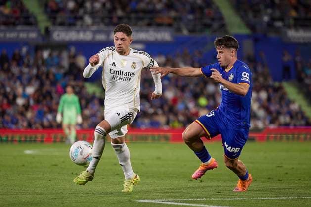 Federico Valverde (Real Madrid CF) and Adrian Liso (Getafe CF) battle for the ball during the LaLiga EA Sports match between Getafe CF v Real Madrid at Coliseum on October 19, 2025 in Getafe, Spain. (Photo by Manu Reino DeFodi Images) Federico Valverde Real Madrid CF and Adrian Liso Getafe CF battle for the ball during the LaLiga EA Sports match between Getafe CF v Real Madrid at Coliseum on October 19, 2025 in Getafe, Spain Photo by Manu Reino DeFodi Images