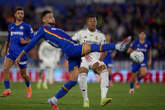 Domingos Duarte (Getafe CF) and Kylian Mbappe (Real Madrid CF) battle for the ball during the LaLiga EA Sports match between Getafe CF v Real Madrid at Coliseum on October 19, 2025 in Getafe, Spain. (Photo by Manu Reino DeFodi Images) Domingos Duarte Getafe CF and Kylian Mbappe Real Madrid CF battle for the ball during the LaLiga EA Sports match between Getafe CF v Real Madrid at Coliseum on October 19, 2025 in Getafe, Spain Photo by Manu Reino DeFodi Images