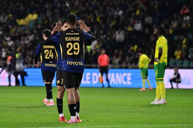 FOOTBALL : Nantes vs Lille - Ligue 1 - 19 10 2025 Hamza Igmane ( 29 - Lille ) celebrates with teammates during the Ligue 1match between FC Nantes and Lille OSC at Stade de la Beaujoire on October 19, 2025 in Nantes, France. ( Photo by Federico Pestellini PsnewZ ) - NantesFrance  Copyright: xFedericoxPestellinix