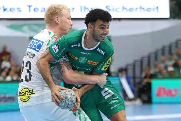 Handball DAIKIN HBL SC DHfK Leipzig SC Magdeburg 19 10 2025 Magnus Saugstrup 23, SC Magdeburg vs Ahmed Khairi 17, SC DHfK Leipzig Handball, DAIKIN HBL, 1 Bundesliga, Season 2025 2026, Matchday 9 SC DHfK Leipzig vs SC Magdeburg on 19 10 2025 at Quarterback Immobilien Arena Leipzig Copyright: xBEAUTIFULxSPORTS JanxKaeferx