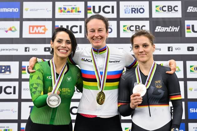 2025 UCI Para-Cycling Track World Championships Picture by Simon Wilkinson SWpix.com - 19 10 2025 - Cycling - 2025 UCI Para-Cycling Track World Championships - Rio Olympic Velodrome, Rio de Janeiro, Brazil - WC2 Elimination Podium - Flurina Rigling (Switzerland) receiving the Gold Medal to become World Champion with Sabrina Custodia Da Silva (Brazil) receiving the Silver Medal and Maike Hausberger (Germany) receiving the Bronze Medal Copyright: x xSWpix.comx(t axPhotographyxHubxLtd)xSimonxWilkinson SWpix.comx SWP-3030-10317