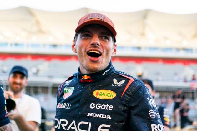 Dutch Formula One driver Max Verstappen of Red Bull Racing is seen after taking a team photo following his win in the Formula One United States Grand Prix at the Circuit of the Americas in Austin, Texas on Sunday, October 19, 2025.  AUS2025101981 GREGxNASH