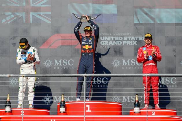 AUSTIN, TX - OCTOBER 19: Oracle Red Bull Racing driver Max Verstappen (1) of the Netherlands holds the trophy high for winning the Formula 1 MSC Cruises United States Grand Prix on October 19, 2025, at Circuit of The Americas in Austin, Texas. (Photo by Ken Murray Icon Sportswire) AUTO: OCT 19 F1 United States Grand Prix EDITORIAL USE ONLY Icon2510190121
