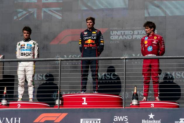 British Formula One driver Lando Norris of McLaren F1 Team, Dutch Formula One driver Max Verstappen of Red Bull Racing and Monaco s Formula One driver Charles Leclerc of Scuderia Ferrari are seen on the podium following the Formula One United States Grand Prix at the Circuit of the Americas in Austin, Texas on Sunday, October 19, 2025.  AUS2025101985 GREGxNASH