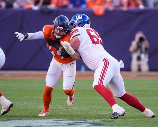 October 19, 2025: New York Giants guard Austin Schlottmann (65) blocks Denver Broncos linebacker Alex Singleton (49) in the second half of the football game between the Denver Broncos and New York Giants. CSM. - ZUMAc04_ 20251019_zma_c04_328 Copyright: xDerekxRegensburgerx