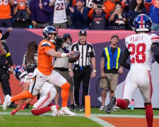 October 19, 2025: Denver Broncos quarterback Bo Nix (10) scores a rushing touchdown in the second half of the football game between the Denver Broncos and New York Giants to put his team up 30-26. CSM. - ZUMAc04_ 20251019_zma_c04_333 Copyright: xDerekxRegensburgerx