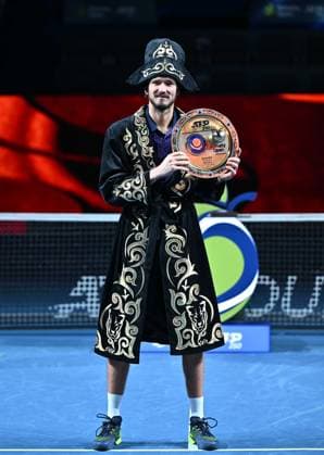 (251020) -- ALMATY, Oct. 20, 2025 -- Daniil Medvedev poses with the trophy during the awarding ceremony for the men s singles final match between Daniil Medvedev of Russia and Corentin Moutet of France at the ATP250 Almaty Tennis Open in Almaty, Kazakhstan, on Oct. 19, 2025. ) (SP)KAZAKHSTAN-ALMATY-TENNIS-ALMATY OPEN--FINAL LixRenzi 