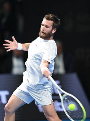 (251020) -- ALMATY, Oct. 20, 2025 -- Corentin Moutet hits a return during the men s singles final match between Daniil Medvedev of Russia and Corentin Moutet of France at the ATP250 Almaty Tennis Open in Almaty, Kazakhstan, on Oct. 19, 2025. ) (SP)KAZAKHSTAN-ALMATY-TENNIS-ALMATY OPEN--FINAL LixRenzi 