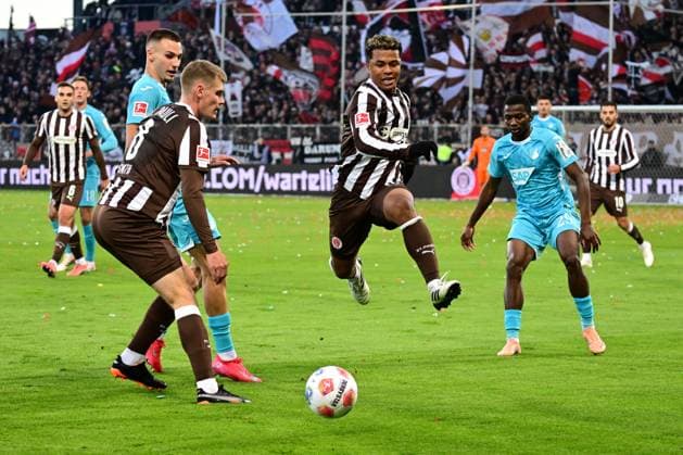 Soccer I Men I 1 Bundesliga l FC St Pauli TSG Hoffenheim I 07 Matchday I Season 2025 2026 I St Pauli I 19 10 2025 I v l Smith Eric St Pauli , Lemperle Tim TSG Hoffenheim , Fujita Joel Chima St Pauli , Sportplatz Millerntor Stadion, St Pauli Hamburg Germany