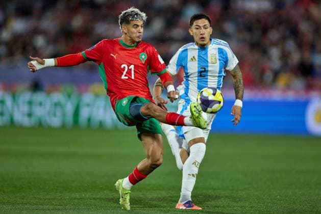 (251020) -- SANTIAGO, Oct. 20, 2025 -- Yassir Zabiri (L) of Morocco shoots tha ball during the final match between Argentina and Morocco at the FIFA U-20 World Cup Chile 2025 in Santiago, Chile, Oct. 19, 2025. ) (SP)CHILE-SANTIAGO-FOOTBALL-FIFA U20 WORLD CUP-FINAL MengxDingbo 