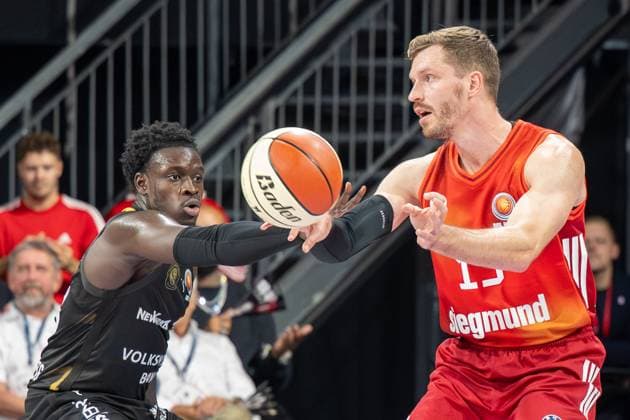 Njie B 13 Loewen Braunschweig in duel with Andreas Obst 13 FC Bayern Basketball , FC Bayern Basketball vs Basketball Loewen Braunschweig, BBL Cup, Round of 16, 20 10 2025 Munich Bavaria Germany Copyright: xkolbert-press UlrichxGamelx