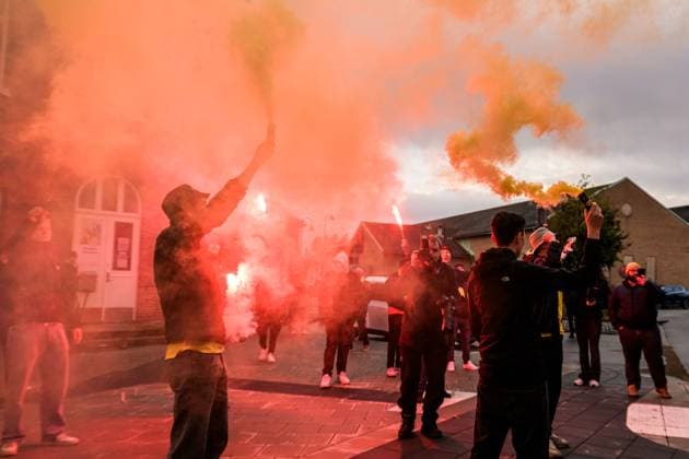 251021 Mjällby supporters wait for the players bus to arrive when the team is welcomed home on October 21, 2025 in Sölvesborg  Copyright: MATHILDAxSCHULER BB251021MA022
