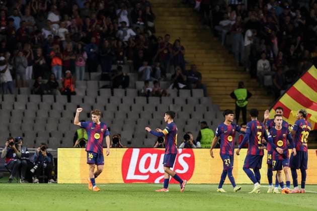 October 21, 2025, Barcelona, Barcelona, SPAIN: Fermin Lopez of FC Barcelona, Barca celebrates a goal with teammates during the UEFA Champions League 2025 26 League Phase MD3 match between FC Barcelona and Olympiacos FC at Estadi Olimpic Lluis Companys on October 21, 2025 in Barcelona, Spain. Barcelona SPAIN - ZUMAa181 20251021_zaa_a181_151 Copyright: xJavierxBorregox