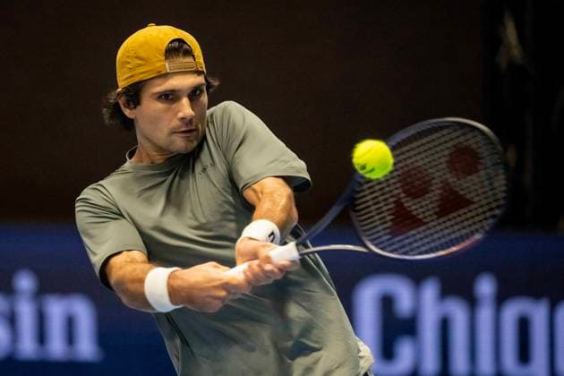 21st October 2025; St. Jakobshalle, Basel, Switzerland; 2025 ATP, Tennis Herren Swiss Indoor Tennis Day 3; Marcos Giron (USA) in action during the match against Denis Shapovalov (CAN) in the first round  DavidxEmm