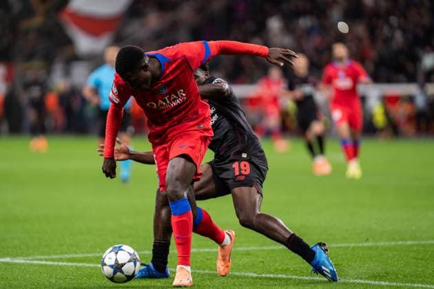 GER, UEFA Champions League, 3. Spieltage - Bayer 04 Leverkusen vs Paris Saint-Germain 21.10.2025, BayArena, Leverkusen, GER, UEFA Champions League, 3. Spieltage - Bayer 04 Leverkusen vs Paris Saint-Germain im Bild: Zweikampf zwischen Nuno Mendes (Paris Saint-Germain, 25) und Ernest Poku (Bayer 04 Leverkusen, 19) nordphotoxGmbHxx xChristianxSchulze nph000300