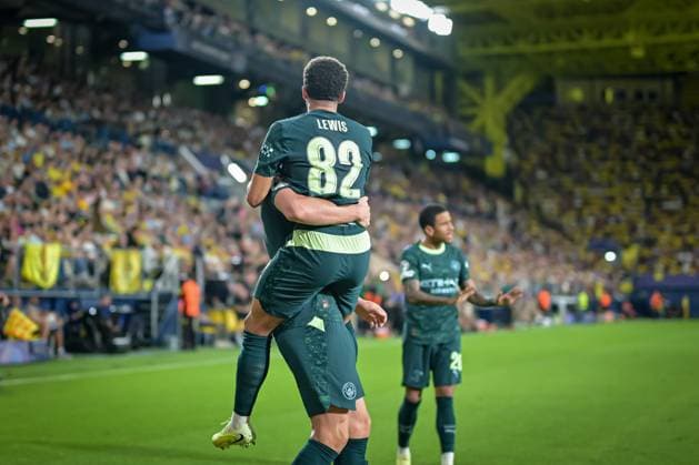 Erling Haaland Manchester City and Rico Lewis Manchester City are celebrating during a UEFA Champions League match between Villarreal FC and Manchester City at Estadio de La Ceramica in Villarreal, , Spain, on October 21 2025 Photo by Felipe Mondino Copyright: x@FELIPExMONDINOx