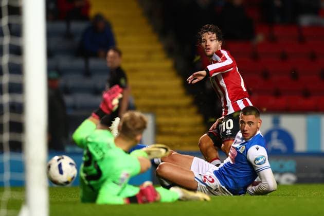 Blackburn, England, 21st October 2025. Callum O Hare of Sheffield United has his shot saved by Balazs Toth of Blackburn Rovers during the Blackburn Rovers vs Sheffield United Sky Bet Championship match at Ewood Park, Blackburn. Picture credit should read: Simon Bellis Sportimage EDITORIAL USE ONLY. No use with unauthorised audio, video, data, fixture lists, club league logos or live services. Online in-match use limited to 120 images, no video emulation. No use in betting, games or single club league player publications. SPI_010_SB_Blackburn_Sheff_Utd SPI-4228-0025