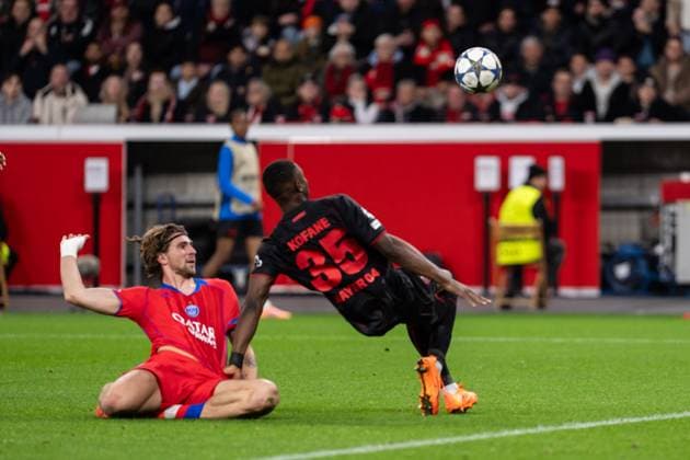 GER, UEFA Champions League, Matchday 3 Bayer 04 Leverkusen vs Paris Saint Germain 21 10 2025, BayArena, Leverkusen, GER, UEFA Champions League, Matchday 3 Bayer 04 Leverkusen vs Paris Saint Germain in picture Foul by Illya Zabarnyi Paris Saint Germain, 6 on Christian Kofane Bayer 04 Leverkusen, 35 tackle nordphotoxGmbHxx xChristianxSchulze nph000300