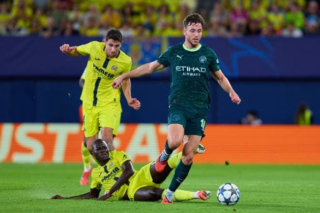 Villarreal CF v Manchester City - UEFA Champions League 2025 26 League Phase MD3 VILLARREAL, SPAIN - OCTOBER 21: Nico Gonzalez of Manchester City competes for the ball with Pape Gueye Left-Back of Villarreal CF during the UEFA Champions League 2025 26 League Phase MD3 match between Villarreal CF and Manchester City at Estadio de la Ceramica on October 21, 2025 in Villarreal, Spain. (Photo by Jose Torres Photo Players Images Magara Press) Villarreal Estadio de la Ceramica Spain Copyright: xJosexTorresx