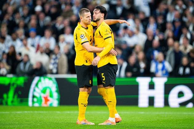 21 10 2025 Football, 2025 2026, Champions League, Matchday 3, FC Copenhagen Borussia Dortmund R Ramy Bensebaini Dortmund celebrates after his goal for 1 2 with L Waldemar Anton Dortmund