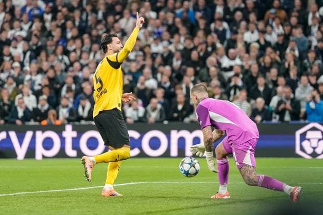Ramy BensebaÃ¯ni (Borussia Dortmund) celebrates after scoring his team s second goal during the UEFA Champions League 2025 26 League Phase MD3 match between F.C. Copenhagen and Borussia Dortmund at Parken Stadium on October 21, 2025 in Copenhagen, Denmark. (Photo by Alex Gottschalk DeFodi Images) Ramy Bensebaïni Borussia Dortmund celebrates after scoring his team s second goal during the UEFA Champions League 2025 26 League Phase MD3 match between F C Copenhagen and Borussia Dortmund at Parken Stadium on October 21, 2025 in Copenhagen, Denmark Photo by Alex Gottschalk DeFodi Images