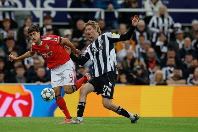21st October 2025; St James Park, Newcastle, England; UEFA Champions League Football, Newcastle United versus Benfica; Antonio Silva of Benfica beats Nick Woltemade of Newcastle United to the ball  CraigxCowan