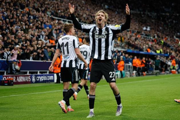 21st October 2025; St James Park, Newcastle, England; UEFA Champions League Football, Newcastle United versus Benfica; Nick Woltemade of Newcastle United celebrates the goal from Harvey Barnes for 3-0  CraigxCowan