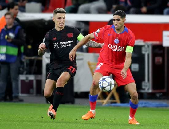 Bayer Leverkusen Vs Paris Saint-Germain in Leverkusen, Germany - 21 Oct 2025 Alejandro Grimaldo of Bayer 04 Leverkusen and Achraf Hakimi of Paris Saint-Germain in action during the UEFA Champions League football match between Bayer Leverkusen and Paris Saint-Germain at the BayArena stadium. ( Final score; Paris Saint-Germain 7:2 FC Bayer Leverkusen ) Leverkusen Germany Copyright: xOsamaxFaisalx xSOPAxImagesx QAT062