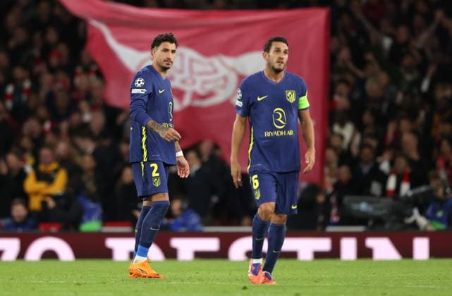 Jose Maria Gimenez (AM) and Koke (AM) dejection after the second Arsenal goal at the Arsenal v Atletico Madrid UEFA Champions League match, at the Emirates Stadium, London, UK on 21st October, 2025. 