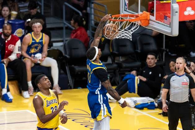 October 21, 2025, Los Angeles, California, USA: Golden State WarriorsÃ¢â‚¬â ¢ Gary Payton II 0 dunks against the Los Angeles Lakers during an NBA, Basketball Herren, USA basketball game at Crypto.com Arena on Tuesday, Oct. 21, 2025 in Los Angeles. Los Angeles USA - ZUMAc68_ 20251021_zaf_c68_093 Copyright: xRingoxChiux