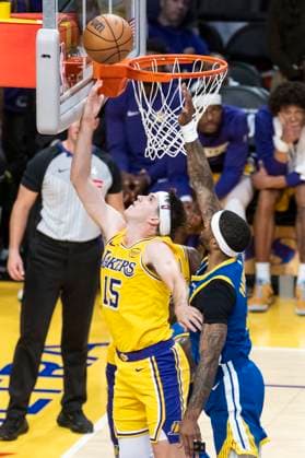 (251022) -- LOS ANGELES, Oct. 22, 2025 -- Los Angeles Lakers Austin Reaves (L) goes to the basket during the 2025-2026 NBA, Basketball Herren, USA regular season match between Los Angeles Lakers and Golden State Warriors in Los Angeles, the United States, Oct. 21, 2025. (Photo by Ringo Chiu Xinhua) (SP)U.S.-LOS ANGELES-BASKETBALL-NBA-LAKERS VS WARRIORS ZhaoxHanrong 