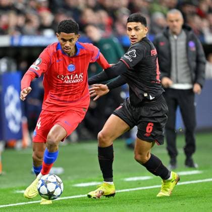 (251022) -- LEVERKUSEN, Oct. 22, 2025 -- Ezequiel Fernandez (R) of Bayer 04 Leverkusen vies with Senny Mayulu of Paris Saint Germain during the UEFA Champions League group stage 3rd round match between Bayer 04 Leverkusen and Paris Saint Germain in Leverkusen, Germany, Oct. 21, 2025. (Photo by Xinhua) (SP)GERMANY-LEVERKUSEN-FOOTBALL-UEFA CHAMPIONS LEAGUE-LEVERKUSEN VS PSG UlrichxHufnagel 
