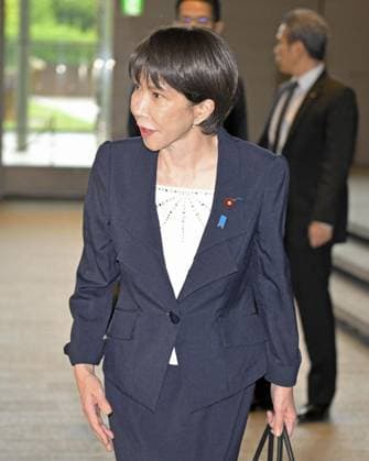 Japan s new PM Takaichi Japanese Prime Minister Sanae Takaichi greets the press as she arrives at the premier s office in Tokyo on Oct. 22, 2025, a day after parliament elected her the nation s first female leader.  A14AA0004964584P