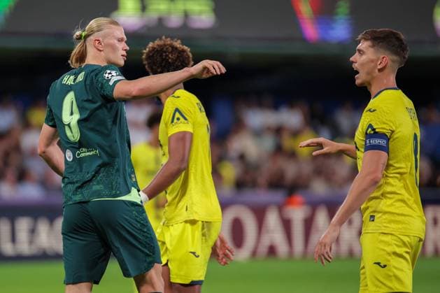 CALCIO - UEFA Champions League - Villarreal CF vs Manchester City Erling Haaland ( 9 - Manchester City) discusses with Juan Foyth ( 8 - Villarreal CF) during Villarreal CF vs Manchester City , UEFA Champions League football match in Vila-real, Spain, October 21 2025 Vila-real Spain  Copyright: xIPAxSport ABACAx