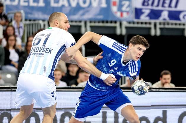HC Zagreb v OTP Bank Pick Szeged: EHF Champions League Luka Lovre Klarica OF HC Zagreb in action against Borut Mackovsek of Pick Szeged during the Men s EHF Champions League group B match between HC Zagreb and OTP Bank Pick Szeged at Arena Zagreb on October 22, 2025. in Zagreb, Croatia.  IgorxKralj PIXSELL