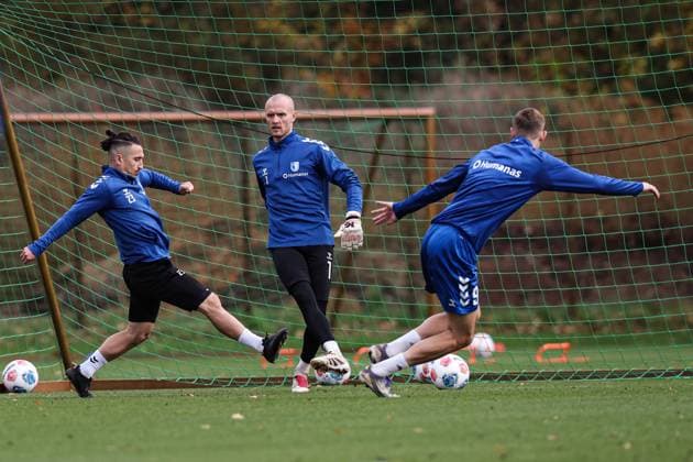 Goalkeeper Dominik Reimann 1 FC Magdeburg,1 against Baris Atik l ,1 FC Magdeburg,23 and Maximilian Breunig 1 FC Magdeburg,9 2 Soccer Bundesliga Season 2025 2026 Training 1 FC Magdeburg at the Avnet Arena in Magdeburg Soccer,Man,Men,Germany,22 10 2025