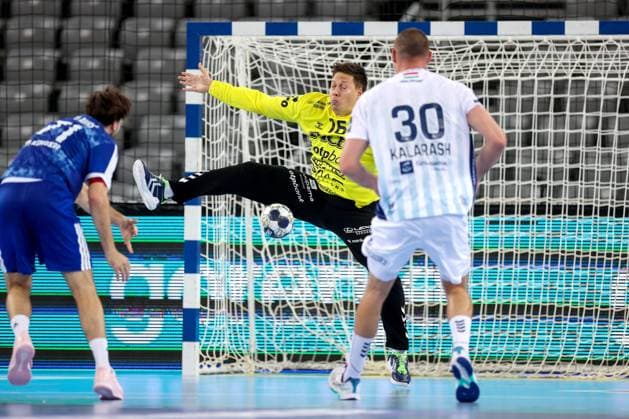 HC Zagreb v OTP Bank Pick Szeged: EHF Champions League Roland Mikler of Pick Szeged saves a goal from Filip Glavas of HC Zagreb during the Men s EHF Champions League group B match between HC Zagreb and OTP Bank Pick Szeged at Arena Zagreb on October 22, 2025. in Zagreb, Croatia.  IgorxKralj PIXSELL