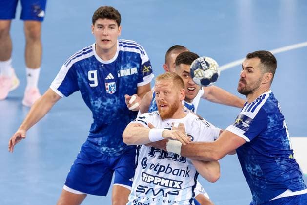 HC Zagreb v OTP Bank Pick Szeged: EHF Champions League Jim Gottfridsson of Pick Szeged and Jakov Gojun of HC Zagreb compete for the ball during the Men s EHF Champions League group B match between HC Zagreb and OTP Bank Pick Szeged at Arena Zagreb on October 22, 2025. in Zagreb, Croatia.  IgorxKralj PIXSELL